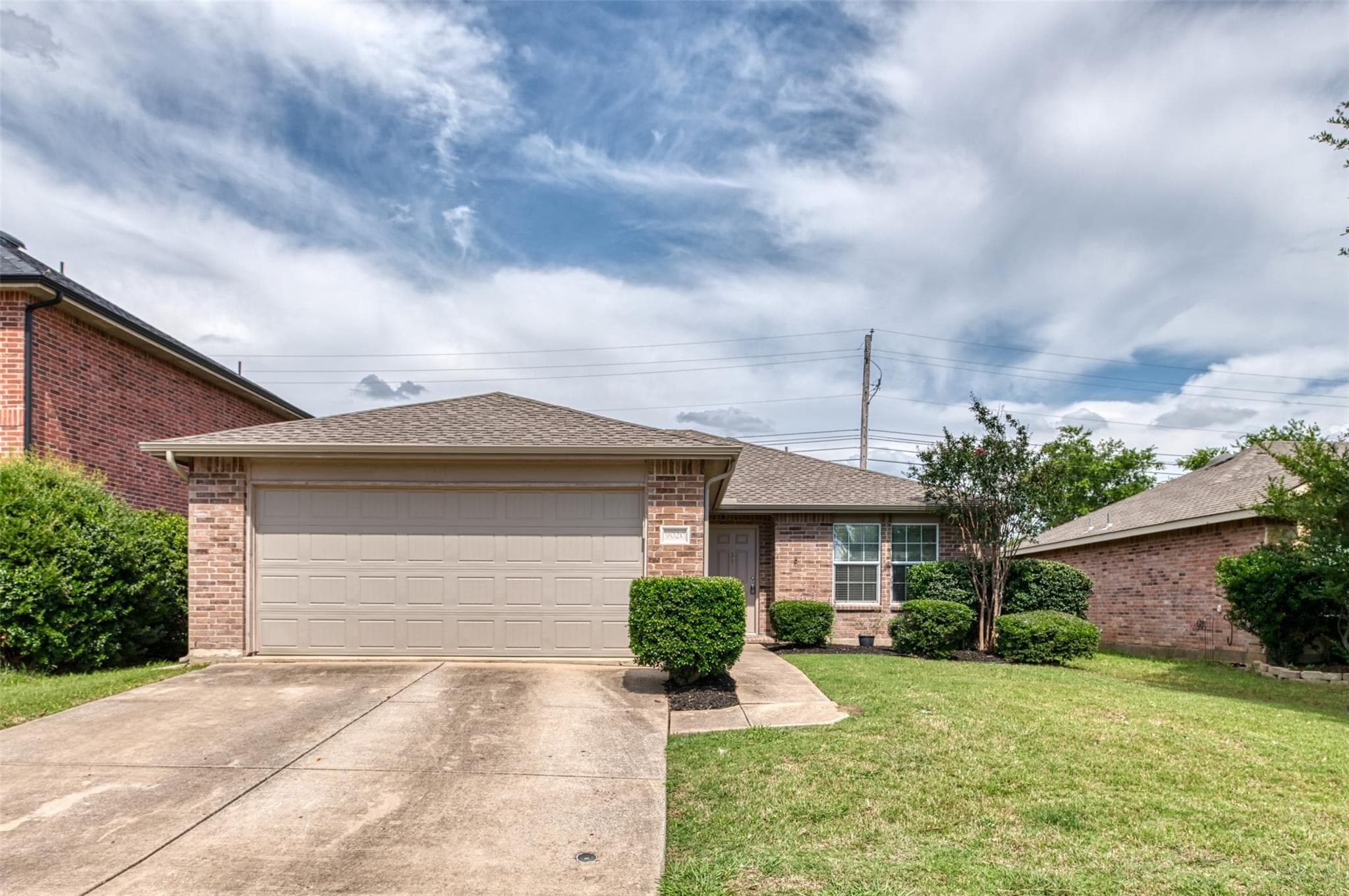 Front exterior of 9020 Noontide Dr, Fort Worth, TX 76179